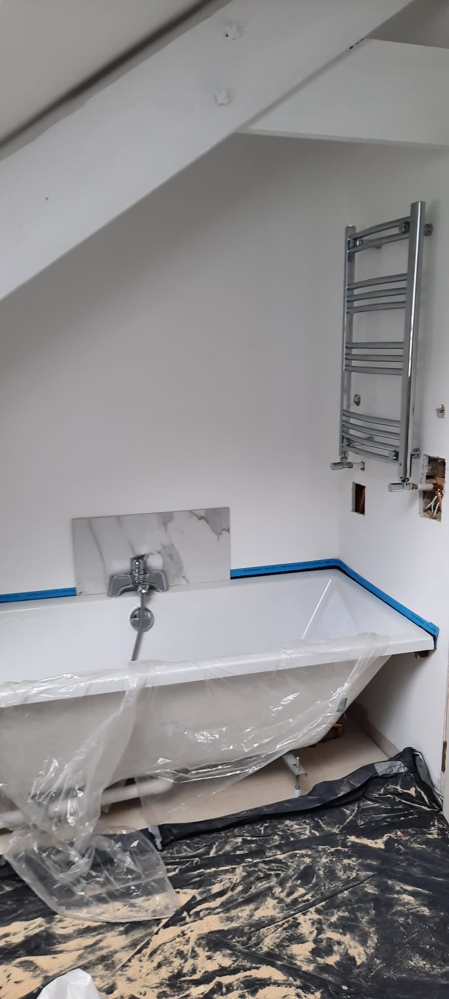 Bath and towel rail first fix