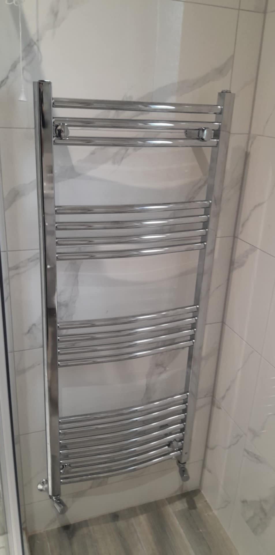 Chrome towel rail fitted